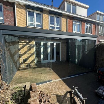 Op maat gemaakte glasschuifwand in Den Bosch