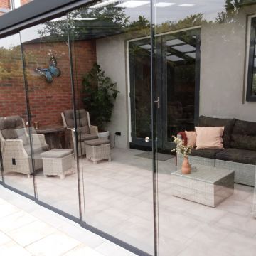 Veranda met glasschuifwandsysteem